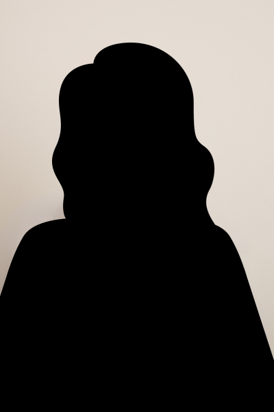 Black silhouette of person with long hair.